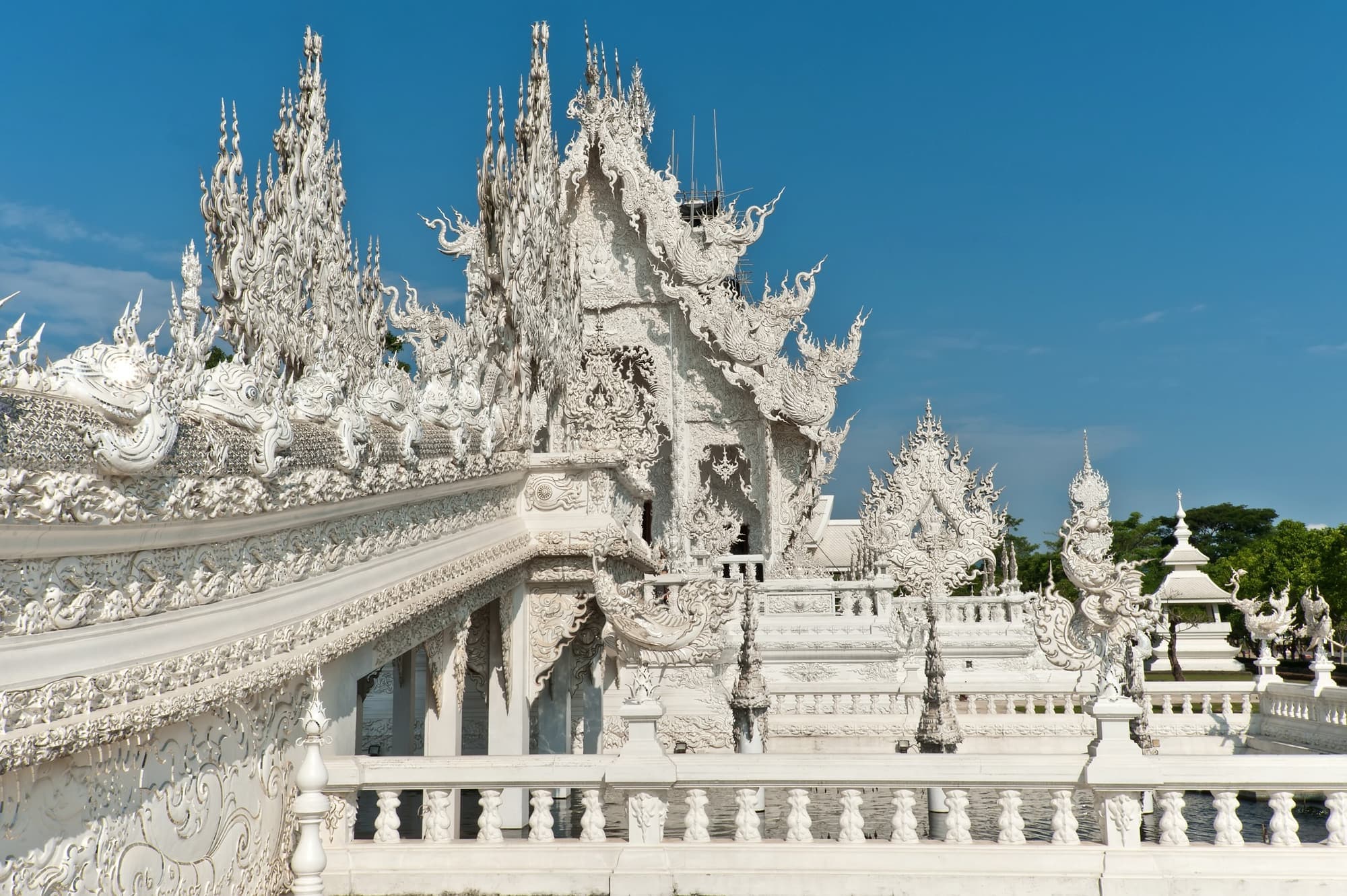 Mirror-mosaic spires of the White Temple in Chiang Rai