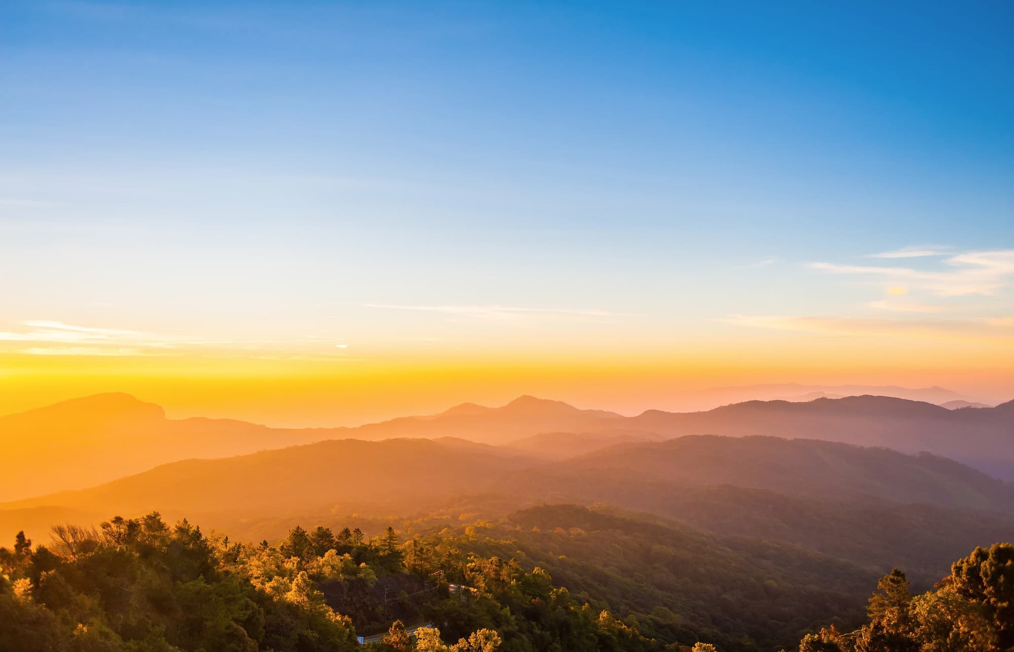 Golden morning light over the mountains of Doi Inthanon National Park