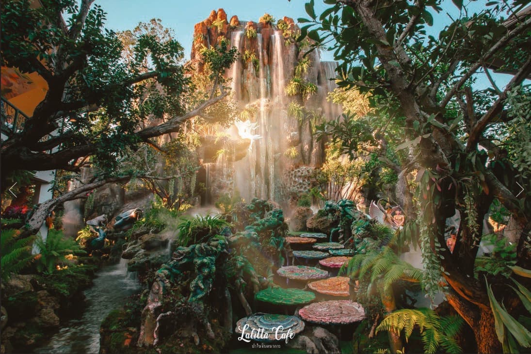 Jungle garden with stepping stones and a waterfall at Lalita Café